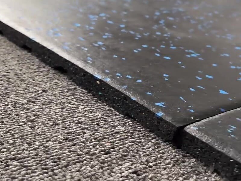 failed gym floor adhesive bubbling